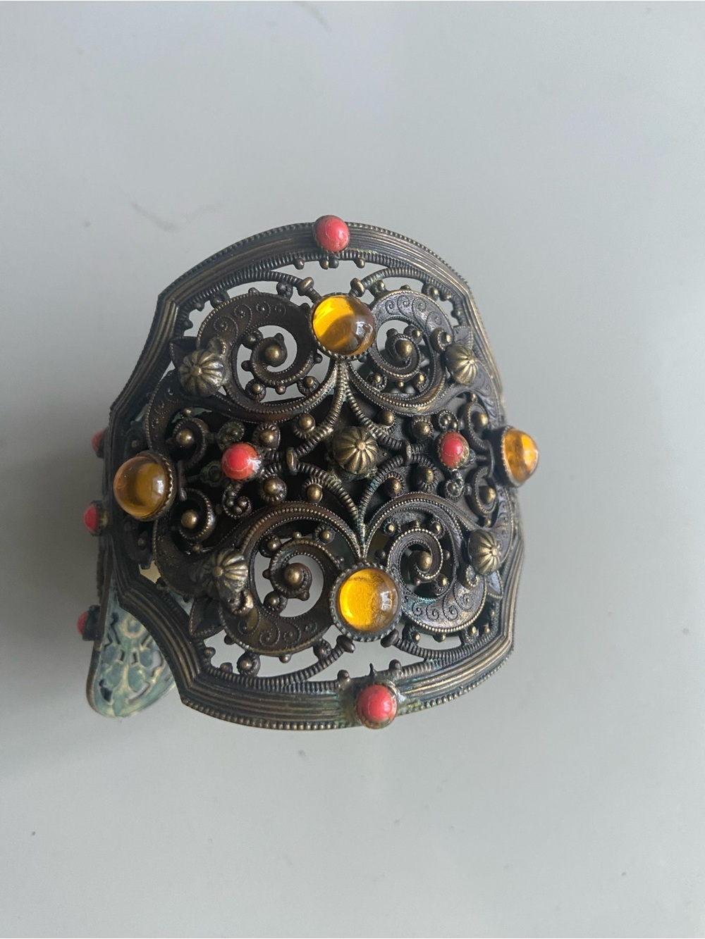 Vintage-Inspired Brass Filigree Cuff Bracelet with Amber and Coral Accents made